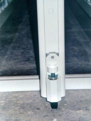 Retenidor de mampara